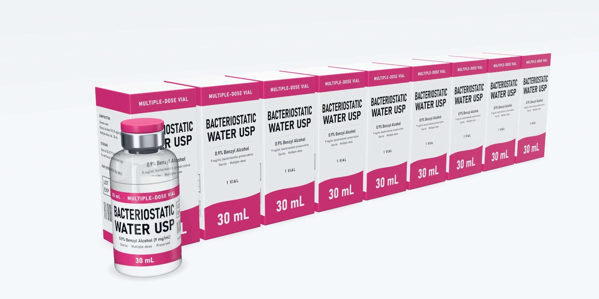 A row of cartons with a vial in front